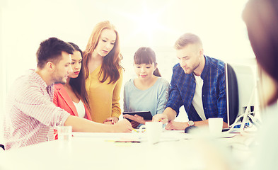 Image showing creative team with papers an tablet pc at office