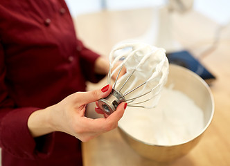 Image showing chef with whisk and whipped egg whites at kitchen