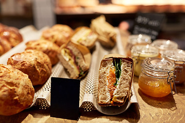 Image showing bread and sandwiches with price at grocery store