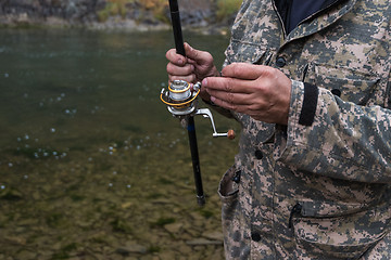 Image showing Fisherman at the Altai river