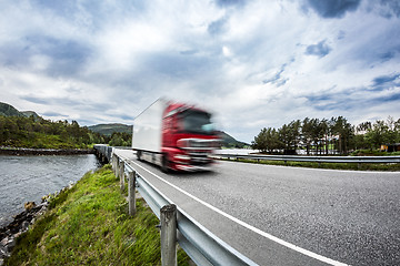 Image showing Fuel truck rushes down the highway, Norwey. Truck Car in motion 