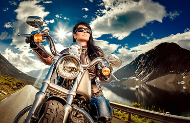 Image showing Biker girl on a motorcycle