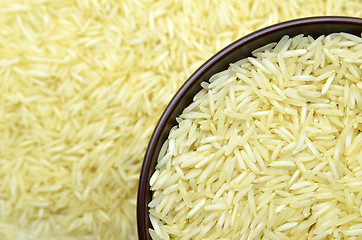 Image showing White basmati rice with wooden bowl