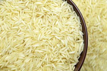 Image showing White basmati rice with wooden bowl