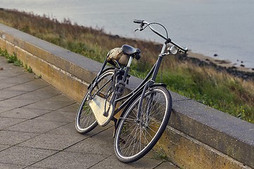 Image showing Bicycle on the road along the river