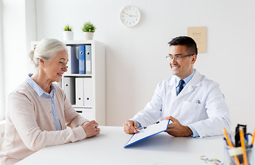 Image showing senior woman and doctor meeting at hospital