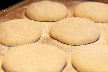 Image showing yeast bread dough on bakery kitchen table