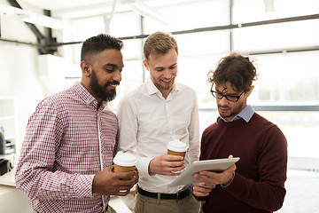 Image showing business team with tablet pc and coffee at office