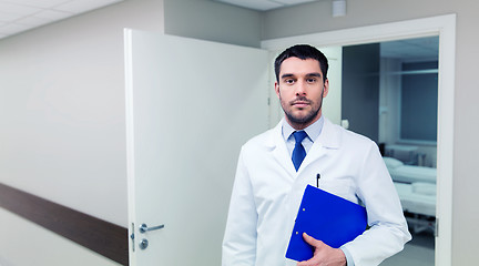 Image showing doctor with clipboard at hospital