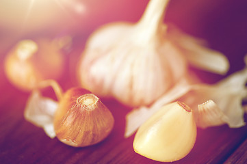 Image showing close up of garlic on wooden table