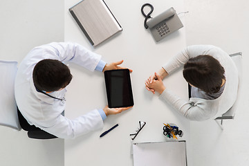 Image showing doctor and young woman meeting at hospital