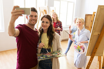 Image showing group of artists taking selfie at art school