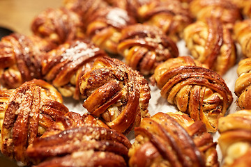 Image showing close up of buns or pies at bakery