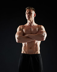 Image showing young man or bodybuilder with bare torso