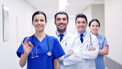 Image showing group of happy medics or doctors at hospital