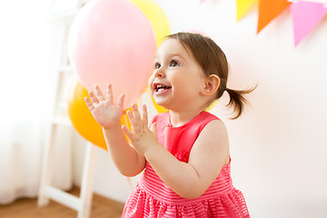 Image showing happy baby girl on birthday party at home