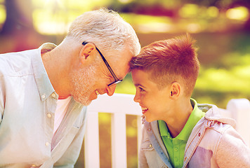 Image showing grandfather and grandson at summer park