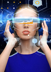 Image showing woman in virtual reality 3d glasses with charts