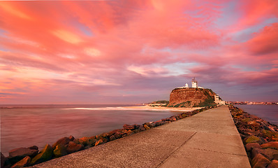 Image showing Red sunrise at Nobby\'s Lighthouse Australia