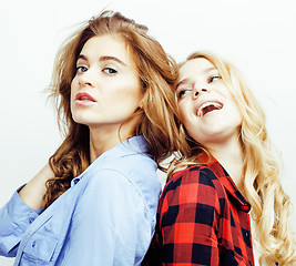 Image showing best friends teenage girls together having fun, posing emotional on white background, besties happy smiling, lifestyle people concept close up