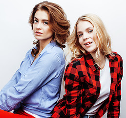 Image showing best friends teenage girls together having fun, posing emotional on white background, besties happy smiling, lifestyle people concept close up