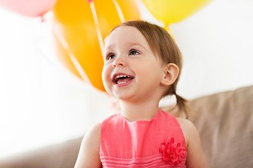 Image showing happy baby girl on birthday party at home