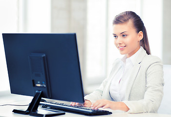 Image showing businesswoman with computer in office