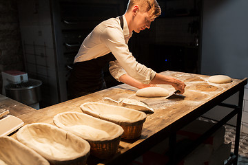 Image showing chef or baker making dough at bakery