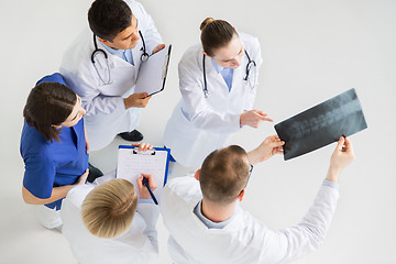 Image showing doctors with spine x-ray and clipboards