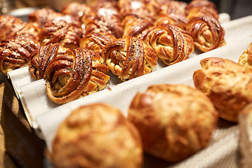 Image showing close up of buns or pies at bakery