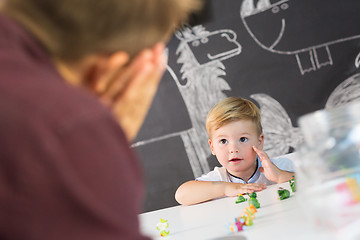 Image showing Cute little toddler boy at child therapy session.