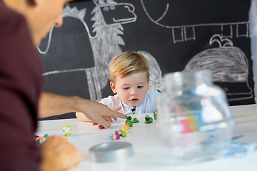 Image showing Cute little toddler boy at child therapy session.