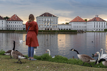 Image showing Dramatic post storm sunset scenery of Nymphenburg palace in Munich Germany.