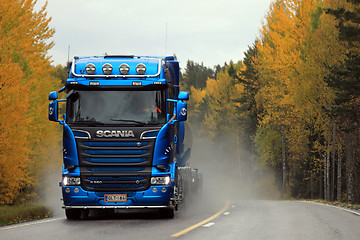 Image showing Blue Scania R580 Tank Truck Transport on Wet Autumn Road