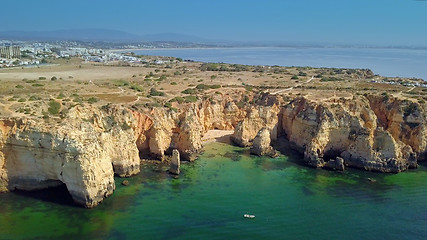 Image showing Landscape of rocky coastline and city