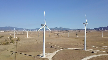 Image showing Windmills in desert