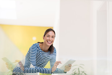 Image showing young woman at home websurfing