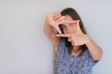 Image showing woman showing framing hand gesture