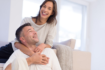 Image showing couple hugging in their new home