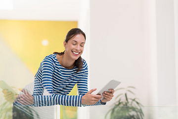 Image showing young woman at home websurfing