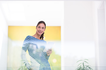 Image showing young woman at home websurfing