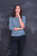 Image showing woman standing in front of chalk drawing board