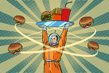 Image showing Astronaut with a tray of fast Food