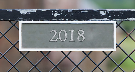 Image showing Sign on fence - 2018