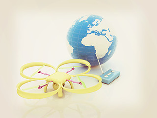 Image showing Quadrocopter Drone with Earth Globe and remote controller on a w