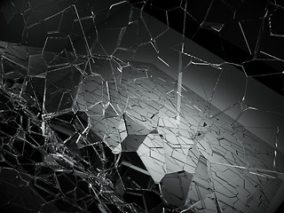 Image showing Damaged or broken glass on black