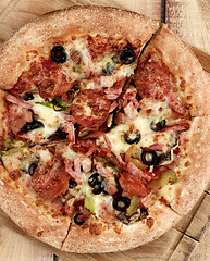 Image showing Pepperoni and Black Olives Pizza