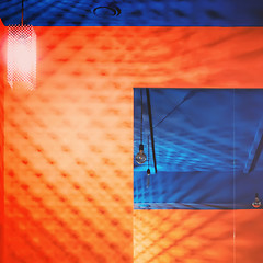 Image showing Blue Ceiling and Orange Wall With Mirror