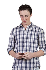 Image showing Casual Man Texting on Cell Phone - White background