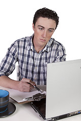 Image showing Businessman at His Desk Working